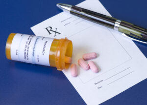 medication errors-prescription bottle and pad